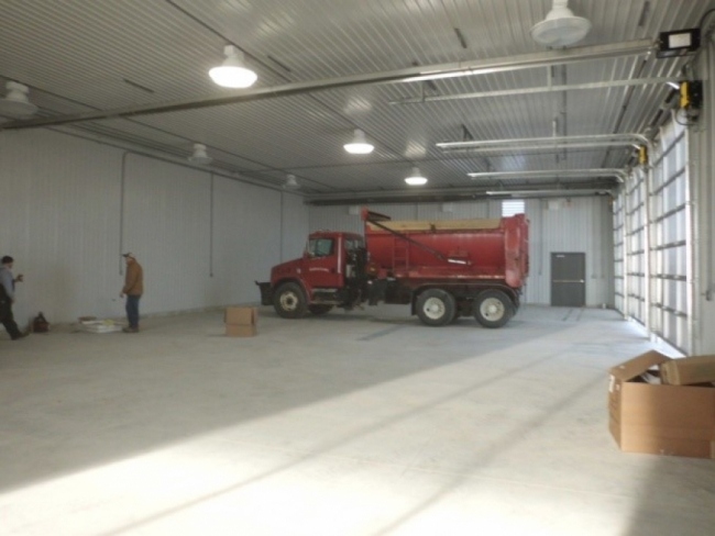 A truck within the yard shed
